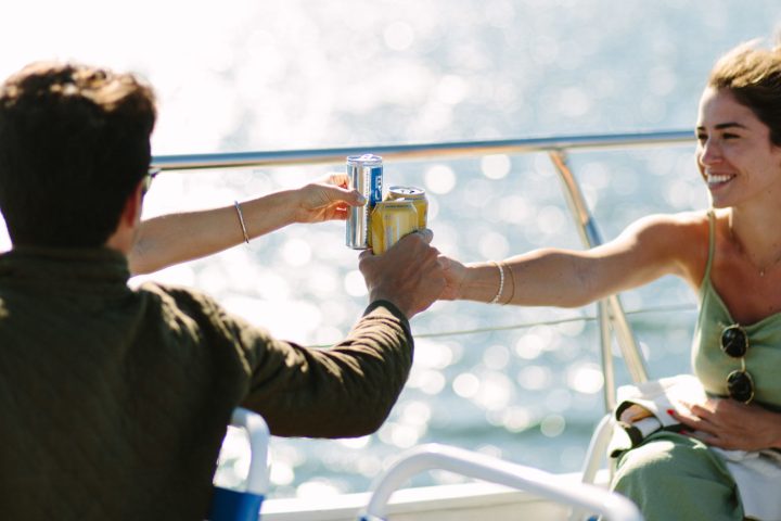 a man and a woman looking at the camera