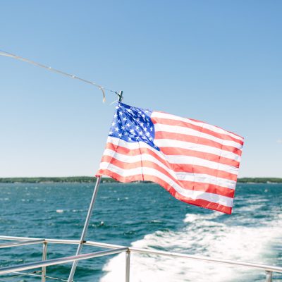 American Flag flying on boat waving in the wind