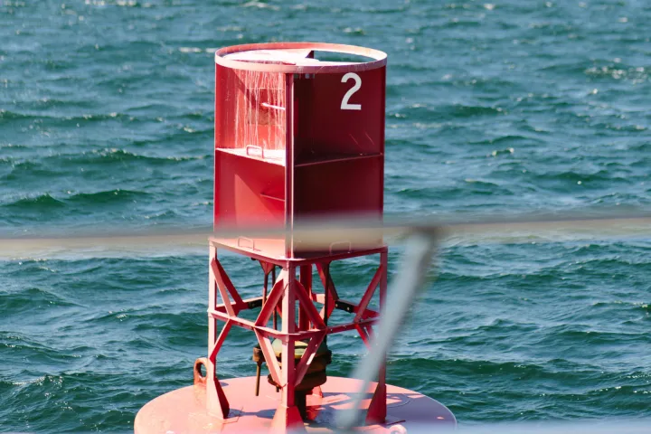 a small boat in a body of water