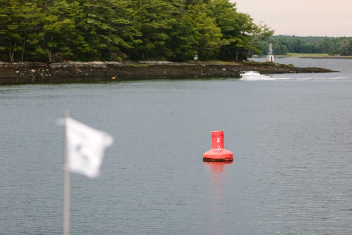 a small boat in a body of water